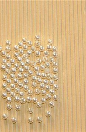 Round pearl beads that are 5mm in size.