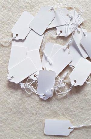 White scalloped rectangle tags